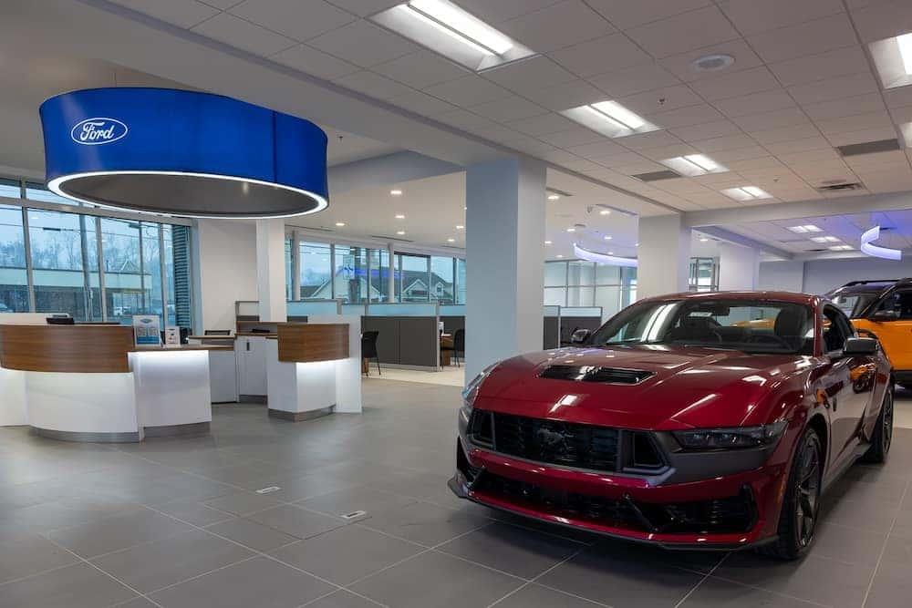 Completed reception and customer-facing millwork at DePaula Ford showroom in Albany